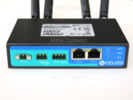 Image of the R2010 Router showing the front panel connectors for all interfaces.